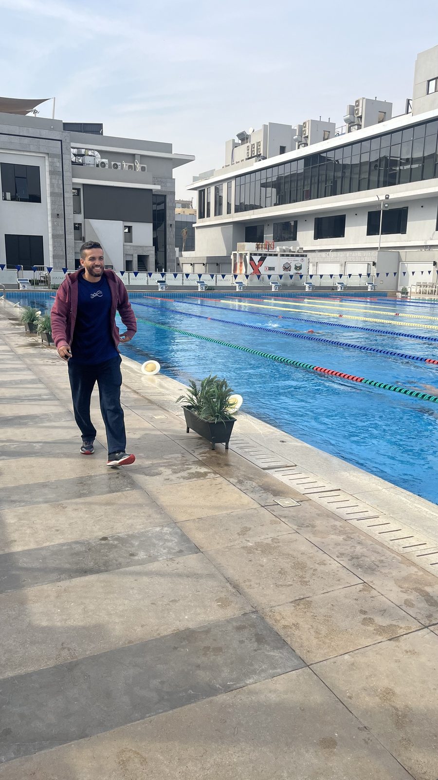 Anas Nezar on the pool deck